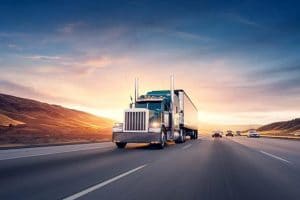 image-of-semi-truck-coming-down-the-highway image of semi truck coming down the freeway